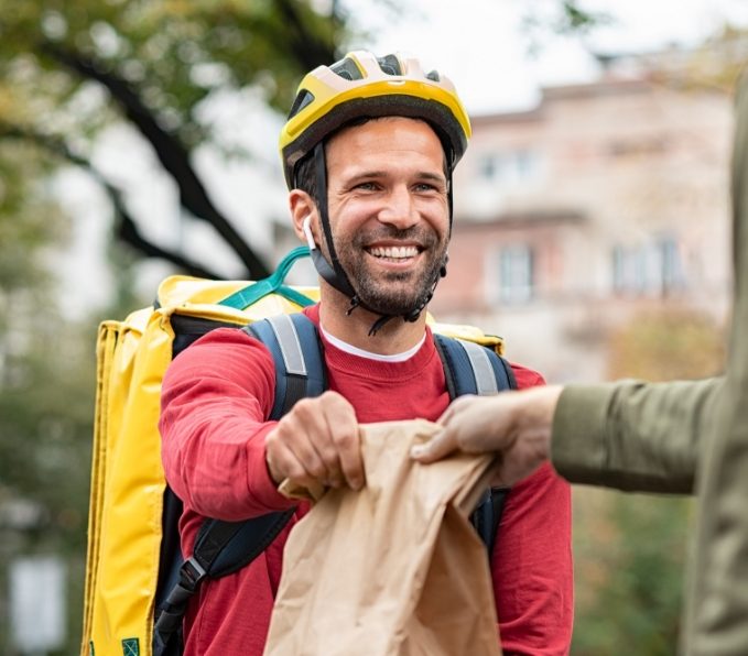 delivery-man-giving-take-away-food-DBXUQTG.jpg delivery-man-giving-take-away-food-DBXUQTG.jpg